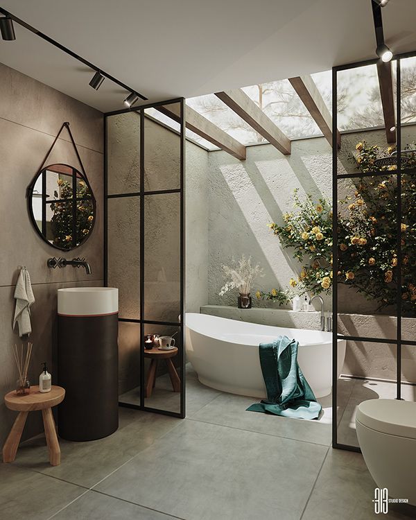 a bathroom with a tub, sink and mirror