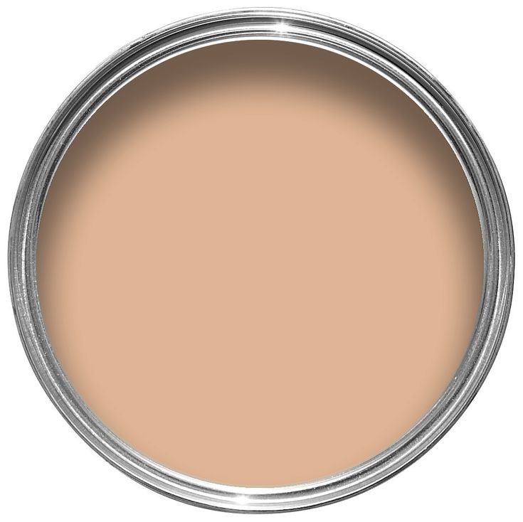 a close up view of a paint can with the lid open and it's light brown