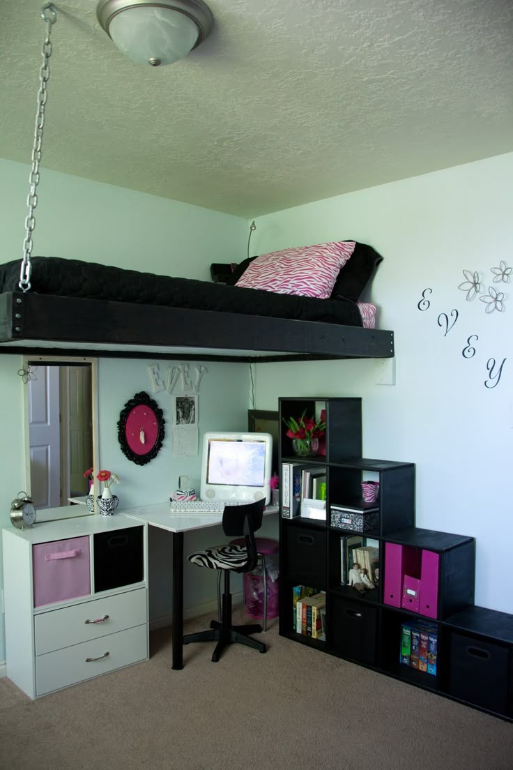 a bedroom with a loft bed, desk and computer on the bottom bunk is shown in an instagram