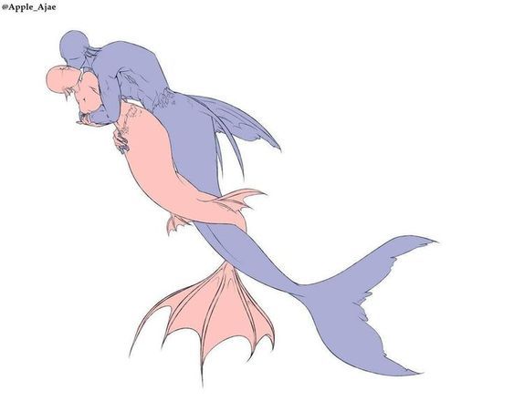 an image of two mermaids hugging each other