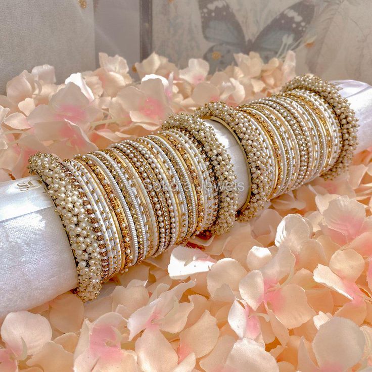 Large stack of antique gold bangles with pretty white shade bangles, finished with sprinkles of crystals and pearls.  Ready to Ship Antique Gold Bangles, Pink White Nails, Bangle Stack, Dior Jewelry, Stacked Bangles, Gold Bangles, White Nails, Antique Gold, Sprinkles