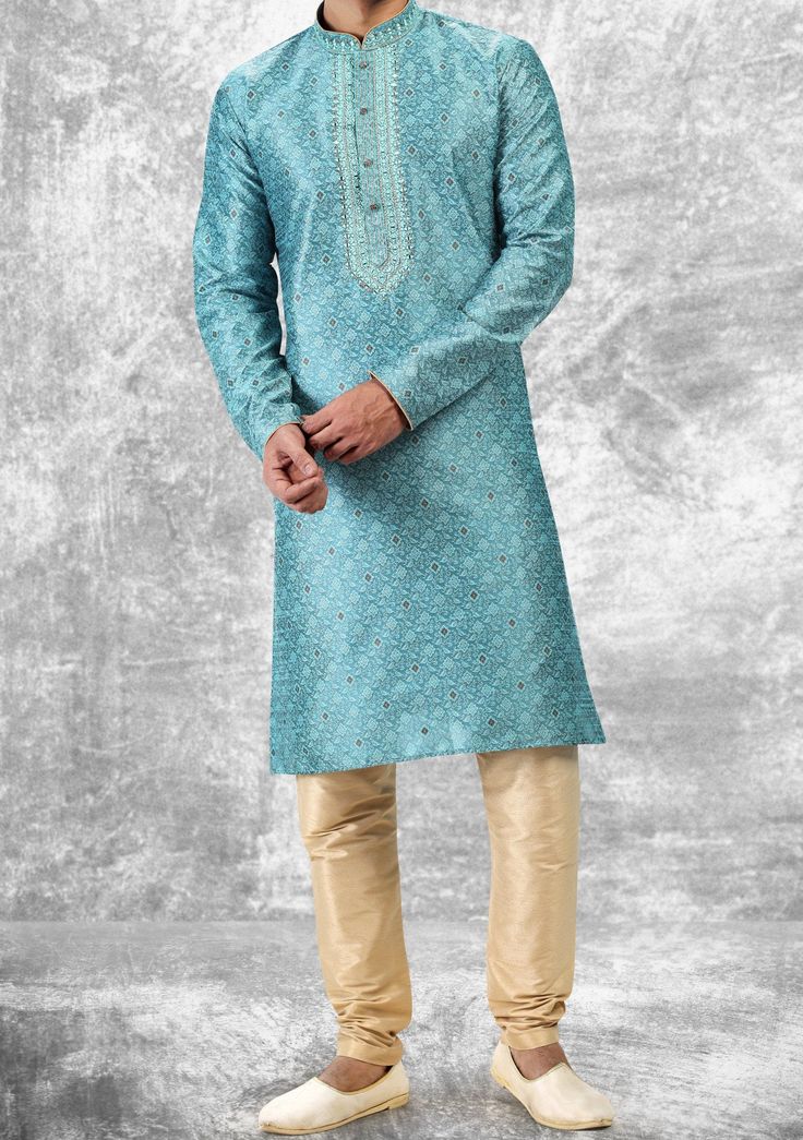 Ready-Made Kurta, With Churidar Pajama. Embroidery, Pintux, and Jacquard Art Silk kurta. Dupion Ready Made Churidar Pajama. Crafted in Chinese Collar Neck, and Full Sleeve. High-Quality Matching Buttons. Please Note: The footwear shown in the picture is for presentation and photography purposes only. Color: There might be slight color variation due to lighting and flashes while the photo shooting. The color may also vary because of different screen resolutions. Wash Care: Dry Clean Only. Light Blue Semi-stitched Kurta For Wedding, Festive Light Blue Embroidered Kurta, Luxury Unstitched Light Blue Kurta, Festive Light Blue Semi-stitched Kurta, Semi-stitched Jamawar Kurta, Chinese Collar, Readymade Saree, Clothing Websites, Churidar