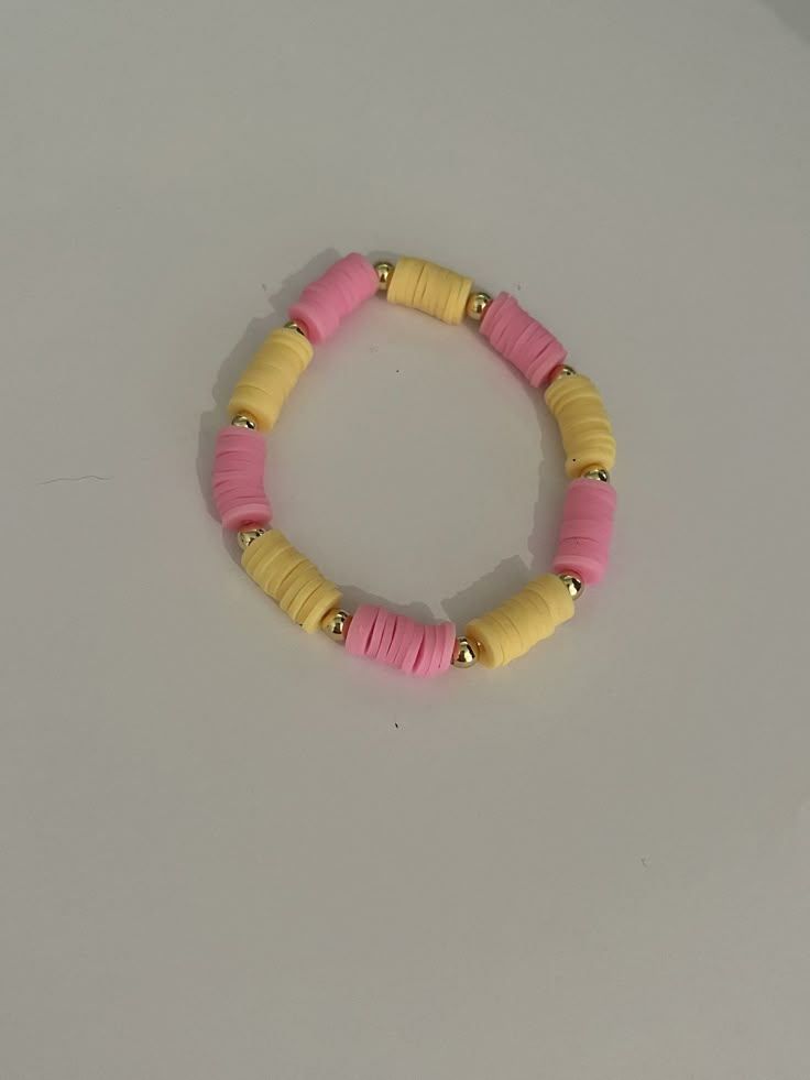 This is a super cute design, it's one of my favorites it's a pink lemonade themed bracelet and I use elastic string so it is somewhat adjustable Cute Yellow Beaded Bracelets For Summer, Handmade Pink Stretch Bracelet For Summer, Adjustable Pink Bracelets For Summer, Cute Pink Stretch Bracelet For Vacation, Summer Pink Stretch Bracelet With Letter Beads, Yellow Adjustable Playful Bracelets, Adjustable Yellow Playful Bracelets, Playful Adjustable Yellow Bracelets, Friendship Sweet Pink Bracelets