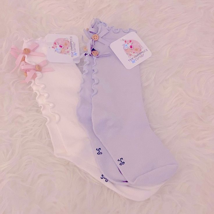 2 Pairs Of Lace Up Socks White And Gray. Size L Fits Age4-6 Years Soft White Spring Socks, Cute Soft White Socks, Playful Soft White Socks, Cute Spring Playtime Socks, Toddler Thigh High Socks, Cute Non-slip Socks For Spring, Cute White Non-slip Socks, Fitted White Harajuku Socks, Cute Cotton Socks For Playtime