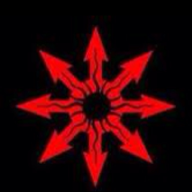 a red and black star on a black background