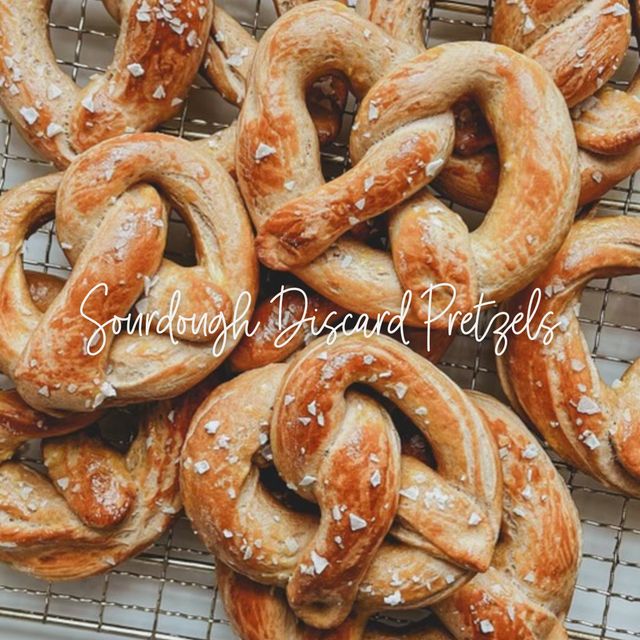 a bunch of pretzels sitting on top of a cooling rack