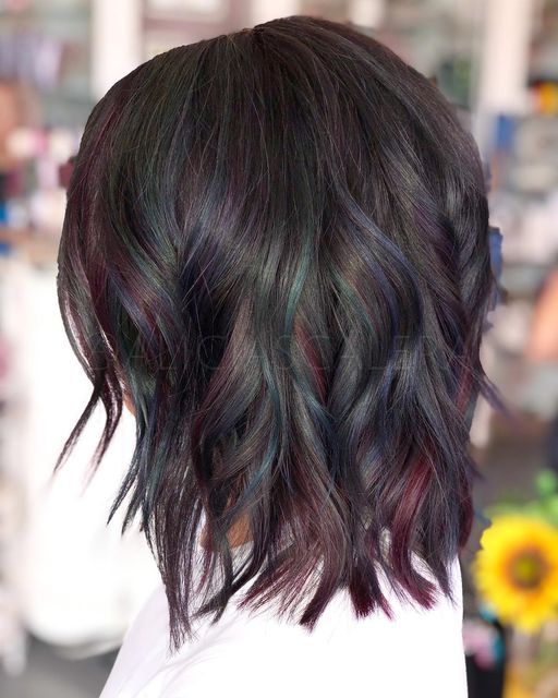 ALICIA SCALERA | STL STYLIST on Instagram: "All these years messing with vivid hair and this was my first crack at the “oil slick” color trend, and I am INTO IT. 🤤 (but honestly all I can really think of is the Oilllll Spiiiiillll chick from Bob’s Burgers😂) • If you know me as a colorist you know I never insist on 100% copying a photo that is shown to me. Instead, I use it as inspiration to do my own interpretation to create whatever your hair goal may be. I choose not to stress over what anot Short Oil Slick Hair, Oil Slick Highlights Dark Hair, Oil Slick Hair Color Brunettes Short, Oil Slick Hair Color Brunettes, Oil Slick Hair Color Light Brown, Short Hair Oil Slick, Oil Slick Hair Color Brunettes Peekaboo, Peekaboo Hair Color Brunettes, Peekaboo Bob