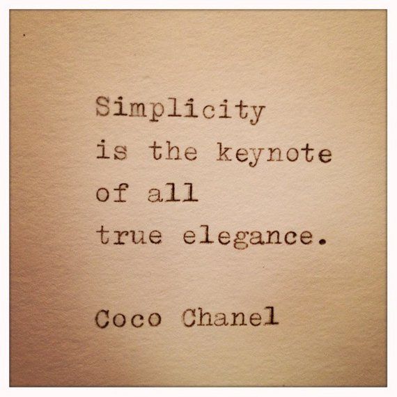 an old typewriter with the words, simplicity is the key to all true elegance coco chanel