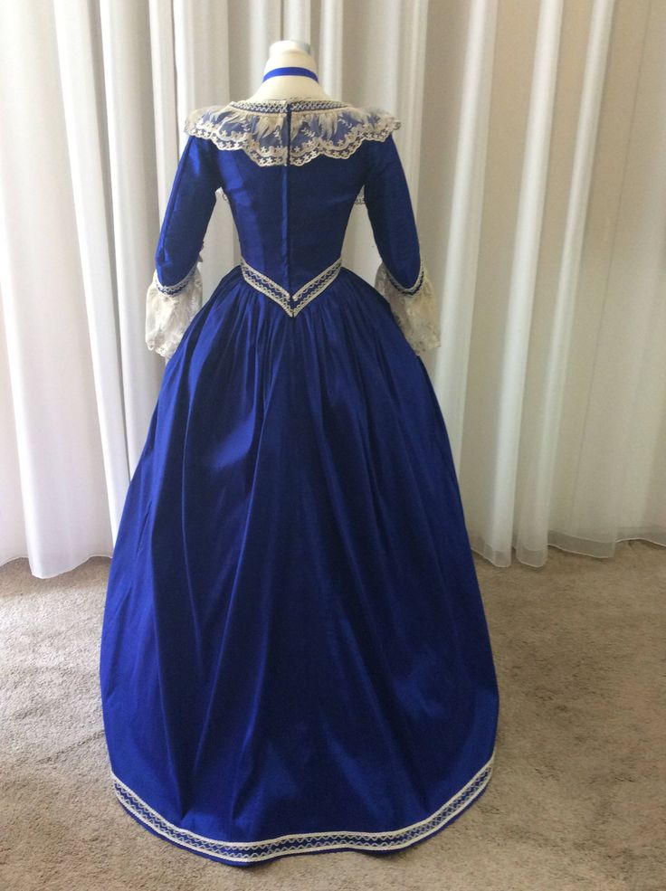 Elegant Blue Victorian Dress For Fancy Dress, Blue Victorian Dress For Fancy Dress Events, Victorian Blue Dress For Fancy Dress Occasions, Victorian Blue Dress For Fancy Dress Events, Victorian Blue Dress For Fancy Occasions, Elegant Blue Gown For Fancy Dress, Blue Victorian Dress With Historical Design, Fitted Blue Victorian Dress For Wedding, Elegant Blue Ball Gown For Fancy Dress