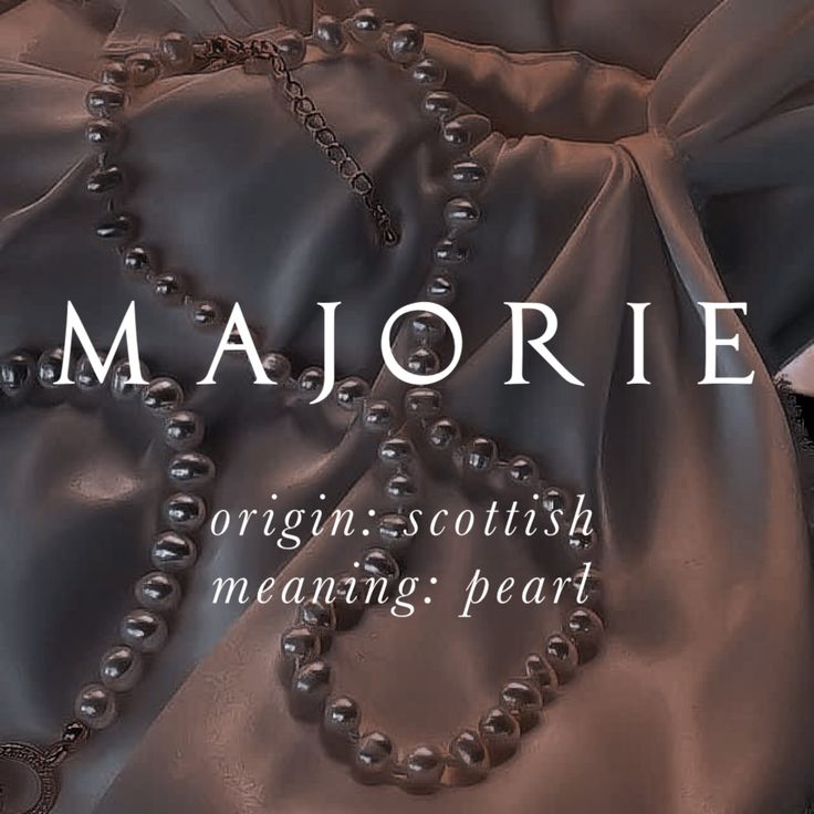 an image of a necklace with pearls on it and the words majorie written in white