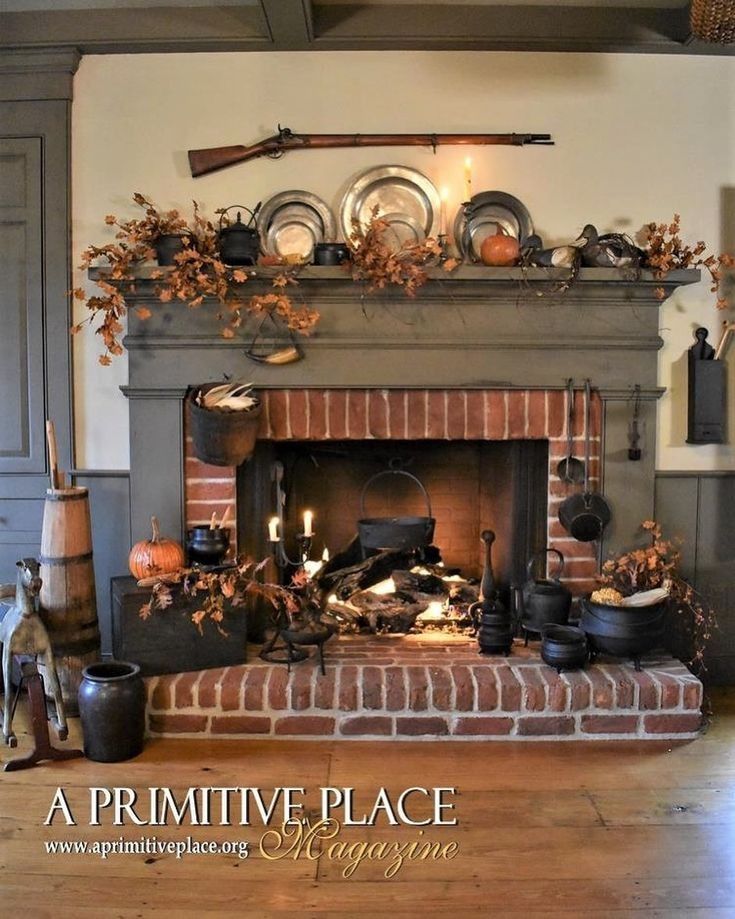 the fireplace is decorated with autumn decorations