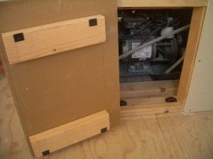 an open box sitting on top of a hard wood floor next to a white wall