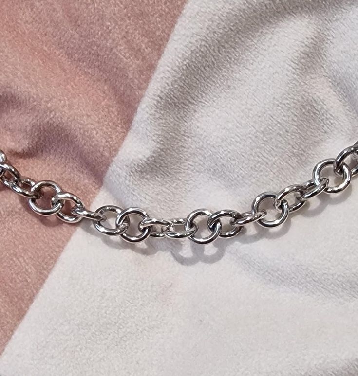 "\"Introducing our handcrafted sterling silver chainlink style chain, a timeless accessory that exudes sophistication and style. Crafted with care using 2mm sterling chain wire, this chain boasts a substantial 10mm thickness, adorned with an 18mm lobster clasp for secure fastening. Weighing a luxurious 94g and measuring 27 inches in length, it is designed to make a statement wherever you go. This sterling silver chain is not just a piece of jewelry; it's a symbol of quality and elegance. Its ver Recycled Necklaces, Timeless Accessories, Holiday Celebration, Sterling Silver Chain, Meaningful Gifts, Sterling Silver Chains, Timeless Beauty, Chain Link, Chains Necklace