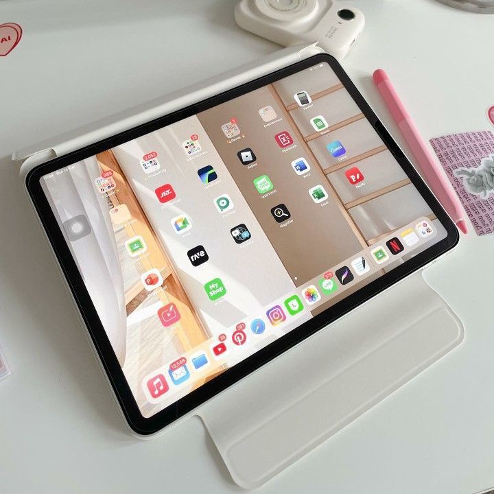 an ipad is sitting on top of a table