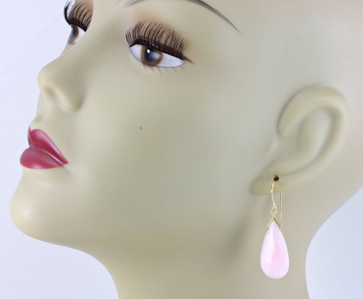 Pink Peruvian Opal earrings. Beautiful shade of soft pink in a faceted teardrop cut. High quality french earwires - either 14k solid yellow gold or 14k gold filled or sterling silver available - you choose. Gemstone size is 15x25mm, over 30 carats, earrings hang 1.5 inches. Naturally lightweight to wear for larger earrings. The mannequin shows the relative size and how they will hang. Please check out my store for more gemstone earrings, bracelets and necklaces. Peruvian Opal, Opal Earrings, Large Earrings, Solid Yellow, Nostril Hoop Ring, Gemstone Earrings, Soft Pink, Solid Gold, Gold Filled