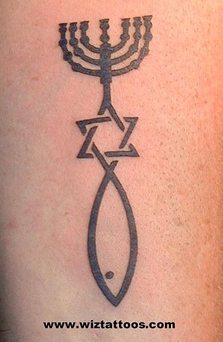 a tattoo with a menorah on it