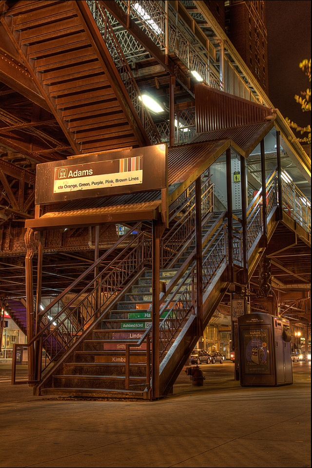 the stairs and railings are lit up at night