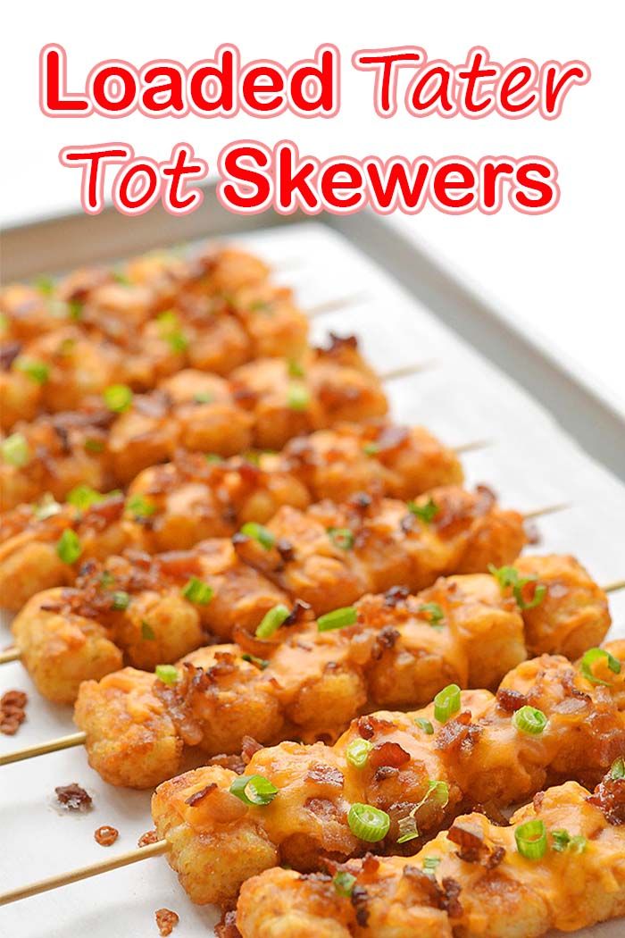 loaded tater tot skewers on a tray with text overlay that reads loaded tater tot skewers