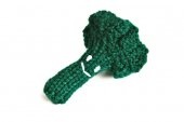 a crocheted green hat with a white button on the front and back side