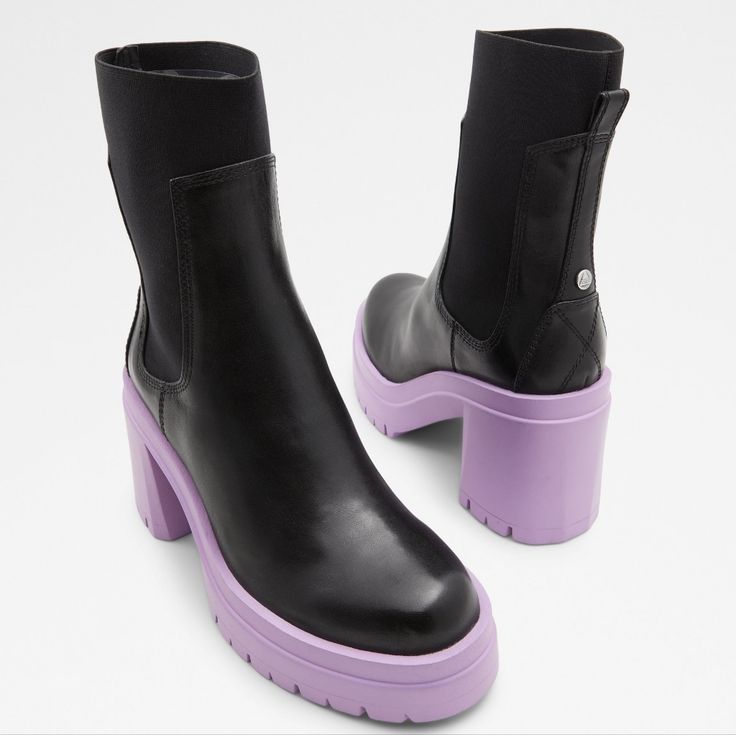 New Without Tags Or Box. From Elongated Side Elastics To Chunky Lug Soles, These High Shaft Heeled Chelsea Booties Are All About Making A Statement. Upper: Smooth Leather Sole: Rubber Chelsea Boot Closed Round Toe Lug Sole Slip-On Side Elastics Color: Black/Bright Purple Tagged A Size 7.5. Measurements (From Aldo Product Page): Heel Height: 3.5'' Platform Height: 1.5'' Shaft Height: 6'' Trendy Purple Platform Boots, Bold Black Ankle Boots, Trendy Purple Ankle-high Boots, Purple Synthetic Boots For Spring, Fall Purple Platform Boots, Purple Synthetic Spring Boots, Bold Black Boots For Spring, Purple Leather Platform Boots, Trendy Purple Boots With Round Toe