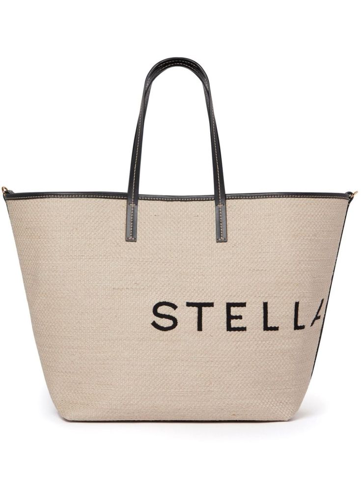 ecru/black contrasting trim two flat top handles jacquard logo motif main compartment removable pouch full lining metal feet open top Raffia Tote Bag, Logo Tote Bag, Stella Mc, Planet People, Contrasting Trim, Chanel 2, Summer Beach Wear, Everyday Bag, Ballet Flat Shoes