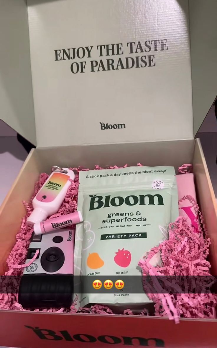 the box is open to show items in it's display case, including an item from bloom