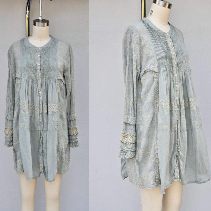 Gorgeous Johnny Was Heavily Embroidered Mini Dress Long Sleeves Color Is A Very Strange And Beautiful- Its A Mix Of Gray & Aqua Blue W/ Ivory Embroidery Button Down - One Button, The Last One Is Different.See Pic. Bohemian Princess - Gypsy Check Out The Sleeves!! Oversized Style Size Xs Measurements Approximately & Laying Flat : Please Refer To The Measurements Provided To Insure Best Fit. Shoulders From Seam To Seam 15" Sleeves 23" Bust 18" Waist Free Or 24" Hips Free Or 32" Length 33" Bohemian Tunic Dress With Buttons, Bohemian Button-up Day Dress, Bohemian Button-up Dress For Daywear, Bohemian Button-up Spring Dress, Bohemian Spring Button-up Dress, Ivory Embroidery, Bohemian Princess, Embroidered Mini Dress, Recycled Clothing