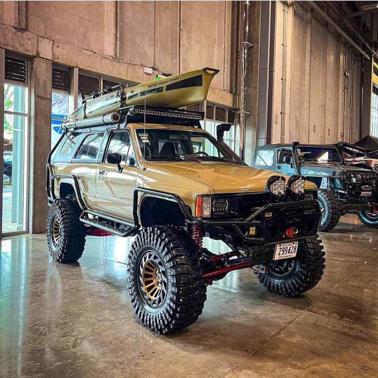 an off road vehicle parked in a garage