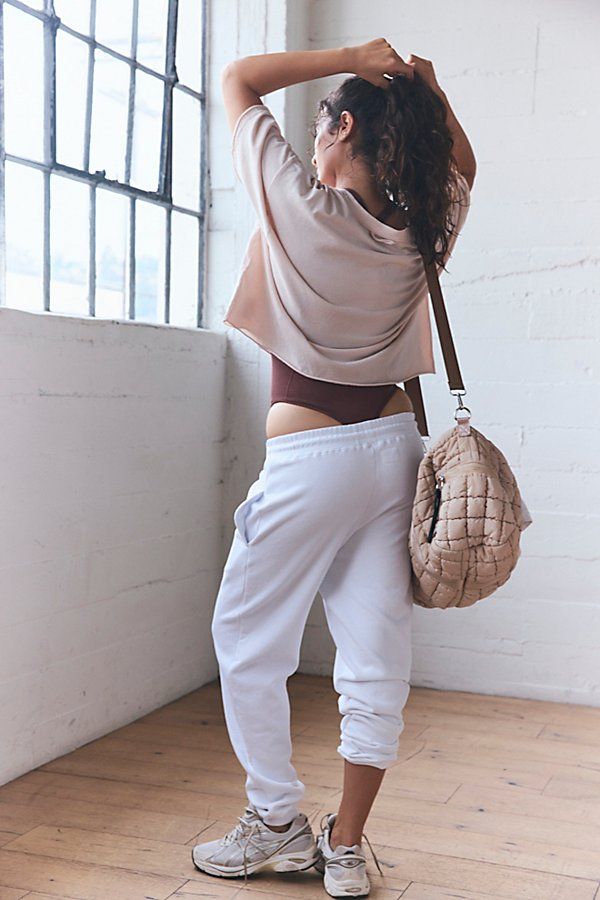 These essential joggers are a must-have for your daily workout commute, featuring a soft terry fabrication with a flattering high-rise silhouette. **Fit:** Relaxed fit; high-rise; ankle length **Features:** Soft, terry fabrication; elasticated waistband with drawstring; elasticated cuffs; side seam pockets; high-rise **Why We | Wanna Play Joggers by FP Movement at Free People, White, XS Relaxed Stretch Sweatpants For Everyday, Relaxed Fit Sweatpants For Yoga, Relaxed Fit Athleisure Sweatpants For Yoga, Versatile Joggers For Workout, Spring Yoga Sweatpants Relaxed Fit, Spring Everyday Joggers With Ribbed Waistband, Spring Yoga Sweatpants With Relaxed Fit, Spring Yoga Sweatpants In Relaxed Fit, Versatile Joggers For Gym