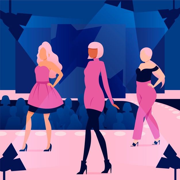 three women in pink dresses walking down a runway