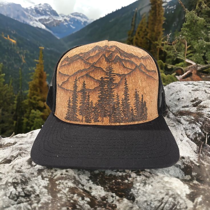 Burned Cork Trucker Hat using Pyrography techniques. Each Hat is an Original. Cork is naturally water (and wine) resistant. But I’ve added an extra sealer on top. Each Cork Hat comes with a Signature Piper Market Bag. Brown Hiking Cap, Brown Curved Brim Trucker Hat For Hiking, Brown Trucker Hat With Curved Brim For Hiking, Eco-friendly Curved Brim Hat For Outdoor, Eco-friendly Curved Brim Outdoor Hat, Flat Brim Hat For Outdoor Activities, Brown Cap For Outdoor Activities, Curved Brim Trucker Hat For Hiking, Brown Curved Brim Trucker Hat For Camping