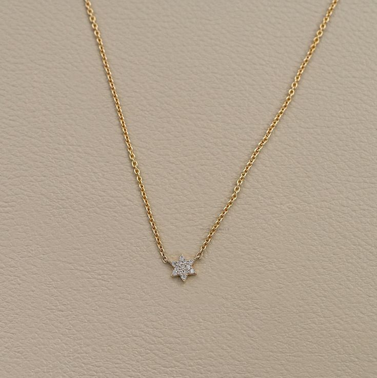 Star of David Diamond Necklace / Round Natural Diamond 14K Gold Necklace / Minimalist Daily Wear Necklace / Small Diamond Necklace For Her SKU: IJS0022 ✯✯ 𝐃𝐢𝐚𝐦𝐨𝐧𝐝 𝐃𝐞𝐭𝐚𝐢𝐥𝐬 ✯✯ ➺ Shape: Round ➺ Color-Clarity: EF-VS/SI, GH-VS/SI, IJ-SI ➺ Size: 1.10 MM ➺ Weight: 0.07 TCW ➺ Diamond Type: Natural Earth-Mined ✯✯ 𝐍𝐞𝐜𝐤𝐥𝐚𝐜𝐞 𝐃𝐞𝐭𝐚𝐢𝐥𝐬 ✯✯ ➺ Length: 14 to 20 Inches (Available in customized sizes to suit you. Please DM regarding that.) ➺ Setting Type: Prong ✯✯ 𝐆𝐨𝐥𝐝 𝐃𝐞𝐭𝐚𝐢𝐥𝐬 Dainty Star-shaped Diamond Necklace, Minimalist Yellow Gold Star Necklace, 14k White Gold Star Necklace, Delicate 14k Gold Star Necklace, Minimalist Yellow Gold Star Of David Necklace, Minimalist 14k Gold Star Of David Necklace, Elegant 14k Gold Star Necklace, Delicate Yellow Gold Star Necklace, Gold Diamond Necklace With Star Charm