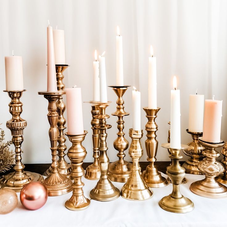 there are many different types of candles on the table