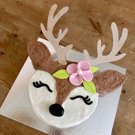 a cake decorated to look like a deer's head