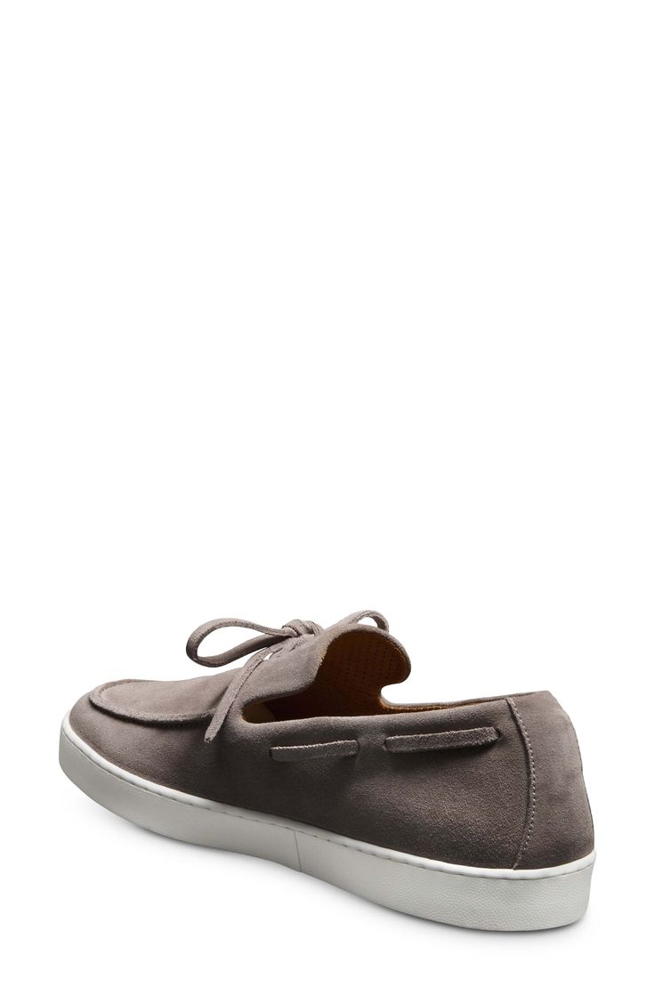 This timeless boat shoe combines with the comfort of a sneaker in this apron-toe style outfitted with leather-lined cushioning. Memory foam cushioning Leather upper and lining/rubber sole Imported Casual Boating Loafers With Plain Toe, Casual Boat Shoes With Removable Insole, Casual Plain Toe Loafers For Boating, Classic Slip-on Sneakers With Stitched Sole, Gray Leather Loafers With Rubber Sole, Low-top Leather Boat Shoes, Classic Lace-up Boat Shoes With Textured Sole, Slip-on Boat Shoes With Textured Sole And Moc Toe, Slip-on Boat Shoes With Textured Sole