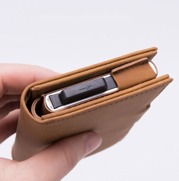 The Kito Vegan Wallet is the perfect minimalist, RFID blocking wallet. The built in ejector cardholder makes accessing your cards quick and easy. Traditional bifold wallets are more like a suitcase with all of the stuff shoved inside of them, whereas this slim wallet leaves no bulges in your pocket. FEATURES SLIM & MINIMAL Compact size reduces the strain on the spine helping to reduce back problems. BIG CARRY Comfortably load up to 8 cards and up to 10 folded bills without any compromise. RFID S Casual Cheap Trifold Wallet For Travel, Luxury Modern Trifold Wallet With Bill Compartment, Luxury Compact Trifold Wallet For Business, Luxury Bifold Wallet For Everyday Use, Casual Cheap Trifold Wallet For Daily Use, Black Trifold Wallet With Cell Phone Pocket, Affordable Casual Trifold Travel Wallet, Cheap Minimalist Trifold Wallet, Cheap Casual Trifold Wallet For Travel