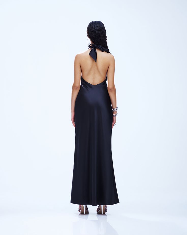 Slip into seduction with this black maxi dress 🖤 Made from luxurious satin charmeuse fabric, this piece is complete with a bias cut and a cowl neck for a look that gives off a chic and mysterious vibe that will have everyone hooked 😌 Evening Satin Slip Dress With Cowl Back, Chic Maxi Dress With Cowl Back For Party, Sleek Silk Floor-length Slip Dress, Elegant Satin Slip Dress With Cowl Back, Satin Dress With Cowl Back For Night Out, Satin Cowl Back Dress For Night Out, Maxi Length Satin Finish Slip Dress For Night Out, Satin Finish Maxi Length Slip Dress For Night Out, Satin Finish Maxi Slip Dress For Night Out