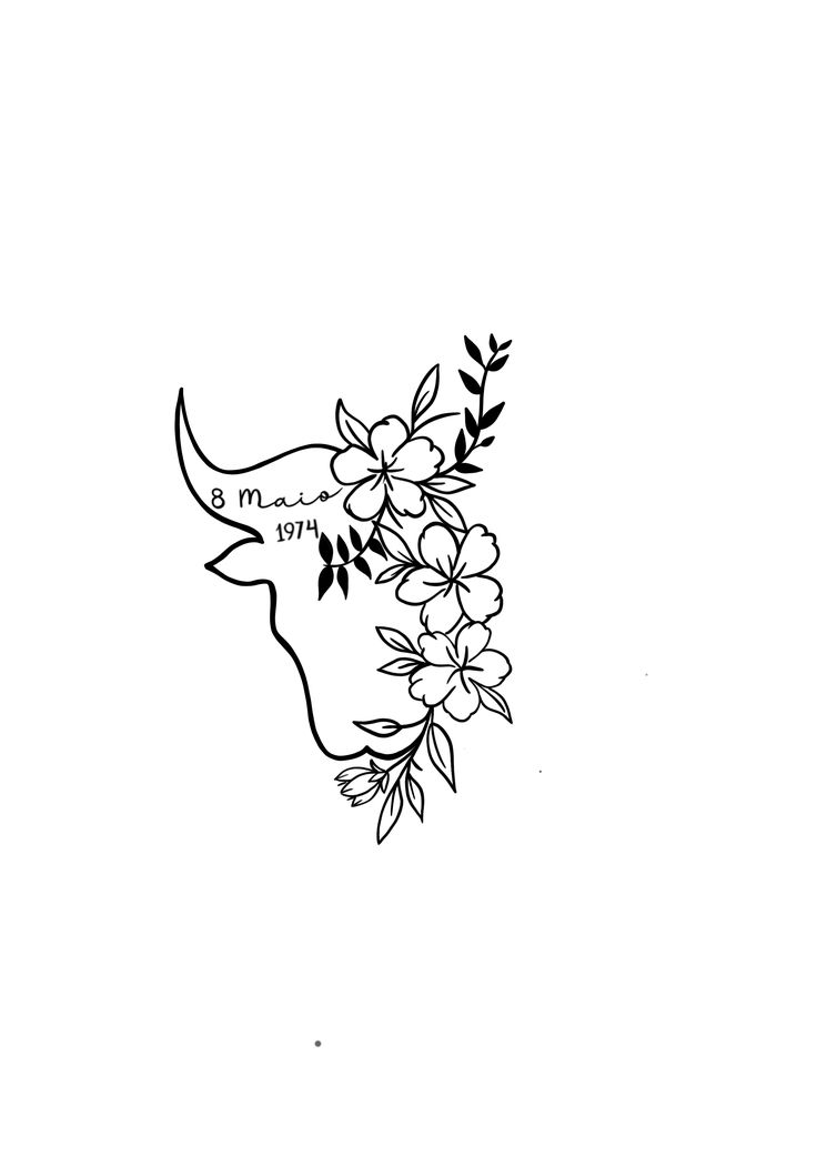 a cow with flowers on it's head and the word love written in black ink