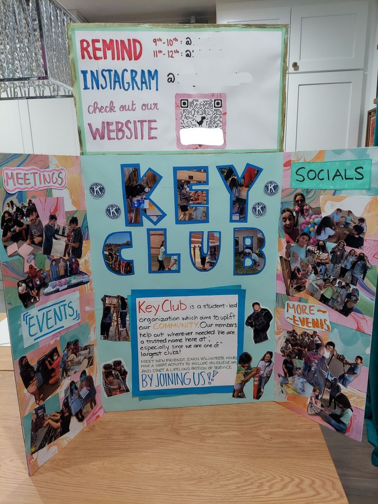 a sign that says key club on it with pictures of people around it and the words key club written in blue