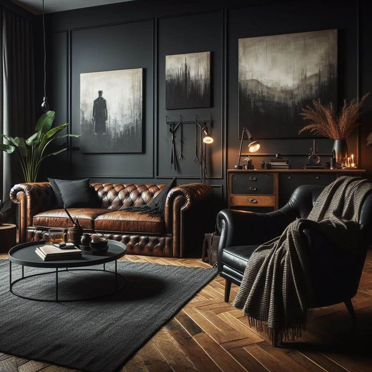 a living room with black walls and leather couches, paintings on the far wall