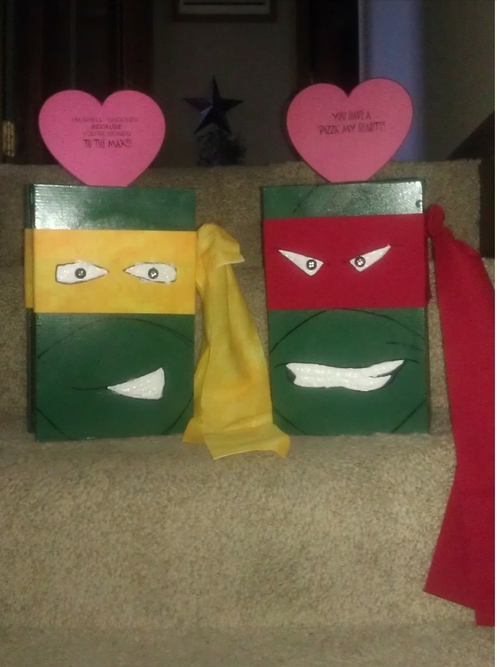 two boxes decorated like teenage mutants with hearts