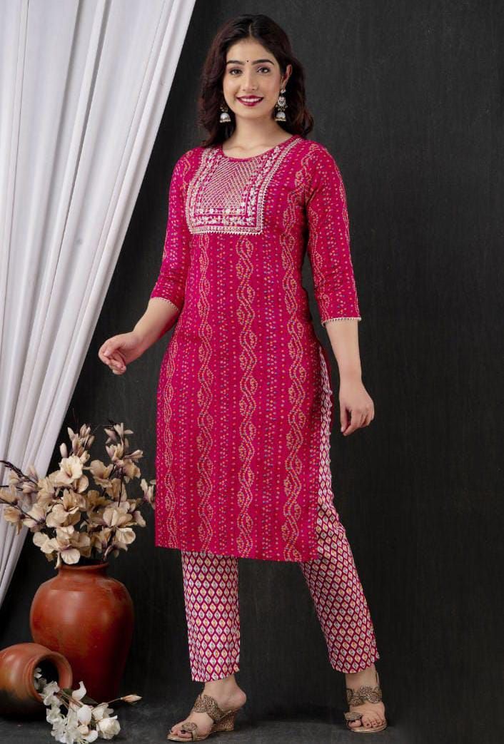 Summer collection kurti pant suit. 3 piece set . Fabric : Reyon fabric kurti , georgette Dupatta with Zari lining, rayon pants. Work : Printed base , border work with Zari lace. Sequence work . Measurement : Kurti length 44in , pant 38 length, Dupatta 2.10 meters, Pink Pant Set With Straight Kurta, Pink Pant Set With Dabka Work, Pink Anarkali Pant Set With Resham Embroidery, Semi-stitched Pink Pant Set For Eid, Pink Pant Set With Dabka Work For Diwali, Pink Resham Embroidery Pant Set For Diwali, Pink Pant Set With Resham Embroidery For Diwali, Pink Pant Set With Resham Embroidery For Eid, Elegant Pink Sharara With Printed Motifs