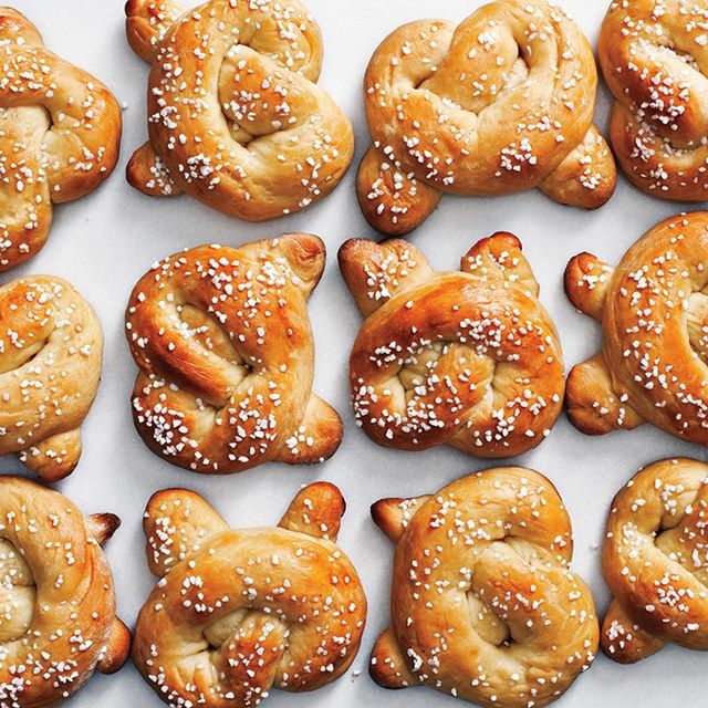 several pretzels are arranged on a white surface