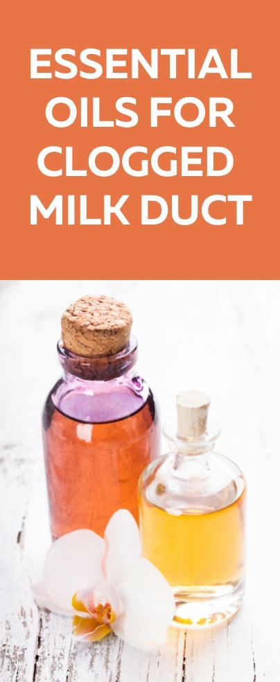 essential oils for clogged milk duct on a white wooden table with text overlay