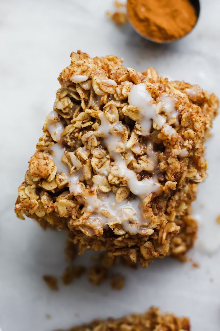 an oatmeal bar with white icing on top