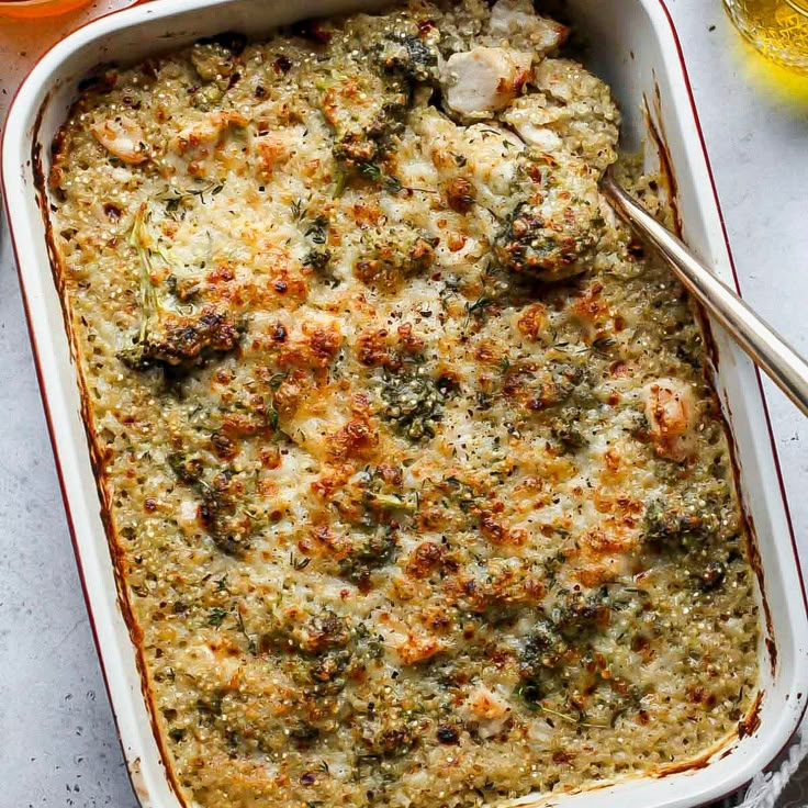 a casserole dish with broccoli, cheese and other ingredients in it