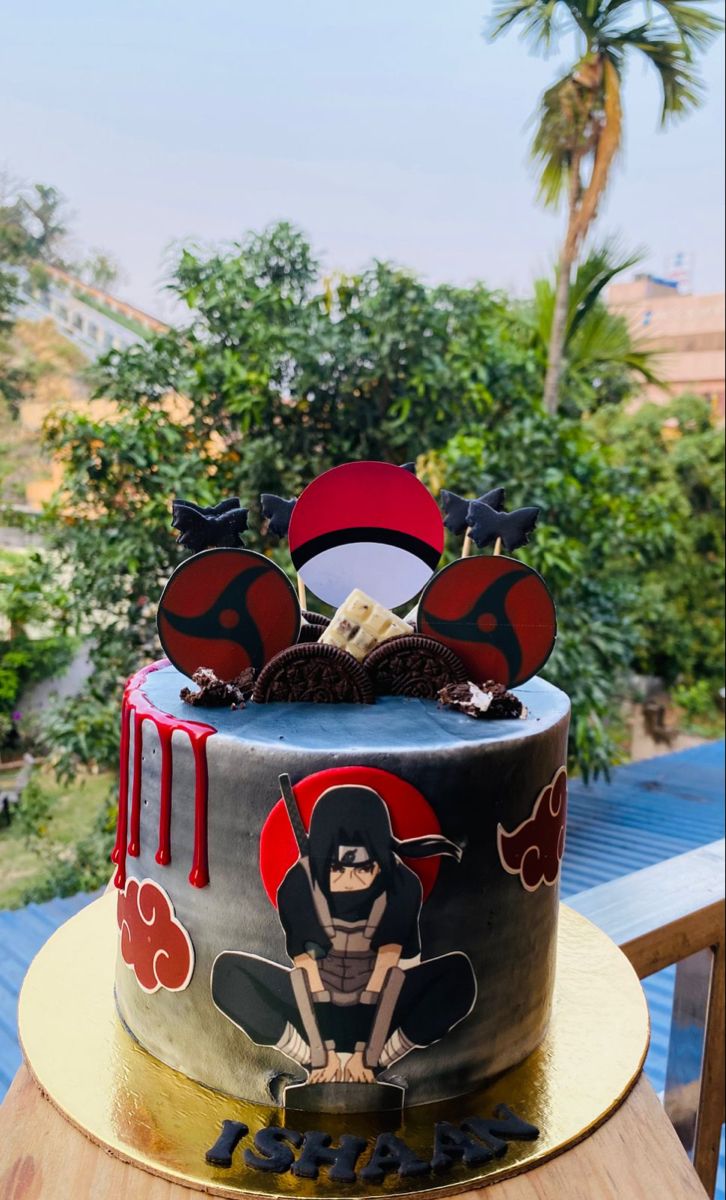 a decorated cake sitting on top of a wooden table