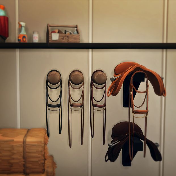 several pairs of shoes hanging from hooks on a wall