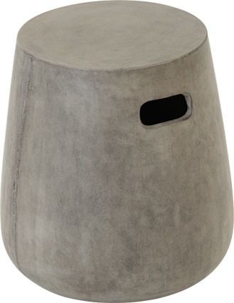 a grey stool that has a hole in the middle and a black patch on it