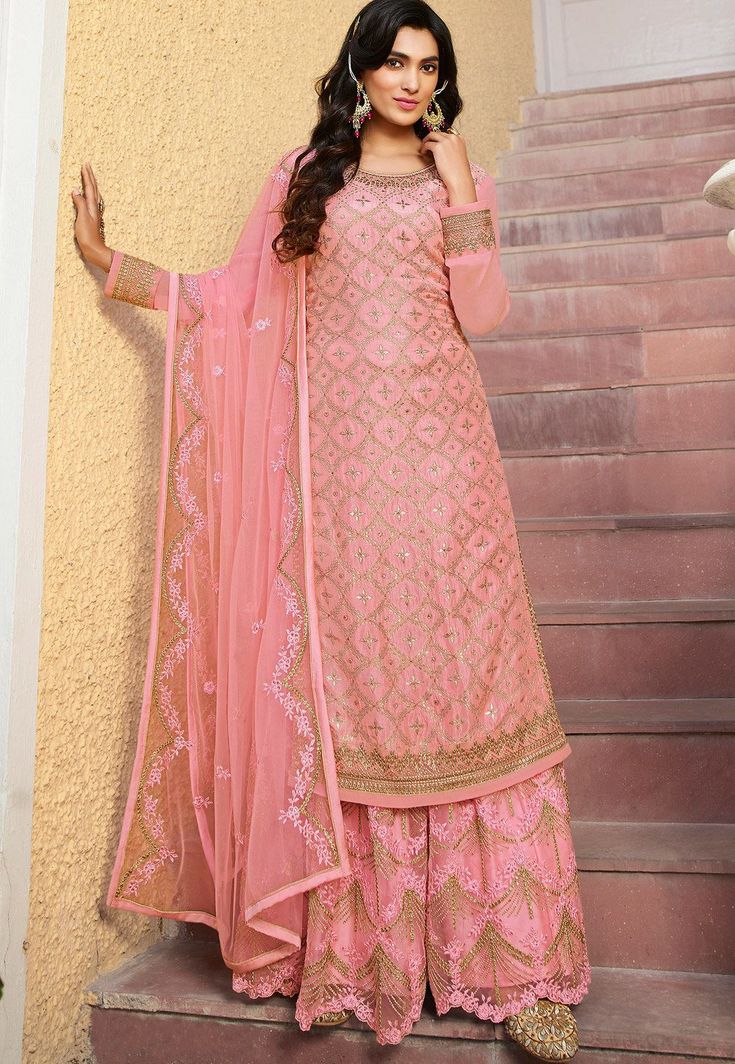 pink jacquard straight heavy palazzo suit 21404  Desc:  Pink Jacquard Straight Heavy Palazzo Suit. Comes with matching Inner Shantoon and Net bottom with Net dupatta. Slight variation in color fabric and work is possible. Model images are only representative. Designs  patterns and colors may slightly vary from the actual color vs. image due to screen resolution or photography lights.Accessories and other item shown in picture is used for photography will not included in order.Ensure that the fir Bridal Anarkali, Bollywood Suits, Readymade Salwar Kameez, Designer Anarkali Suits, Party Sarees, Salwar Kameez Online, Sharara Suit, Designer Anarkali, Pakistani Salwar Kameez